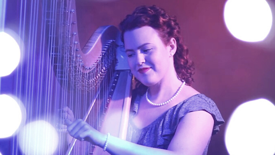 Christy-Lyn playing a lever harp